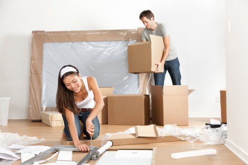 Packed moving boxes and protected furniture ready for removals in Belgravia
