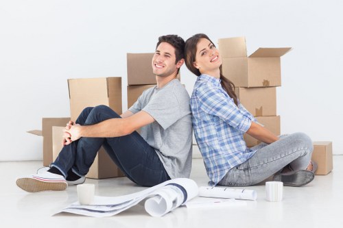 Professional movers managing boxes and furniture in Belgravia