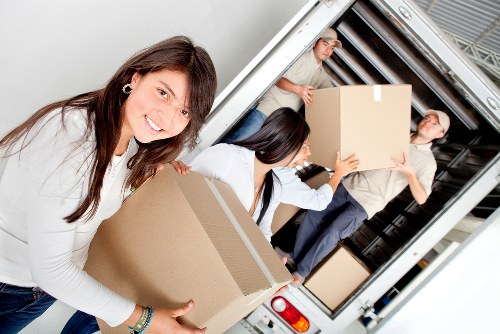 Loading furniture and boxes into a van for a Belgravia relocation